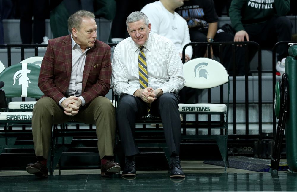 Iowa Hawkeyes assistant coach Kirk Speraw  talks with Tom Izzo against Michigan State Tuesday, February 25, 2020 at the Breslin Center in East Lansing, MI. (Brian Ray/hawkeyesports.com)