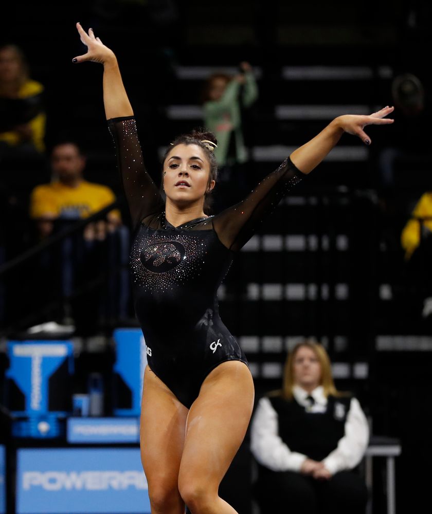 Nikki Youd competes on the floor  