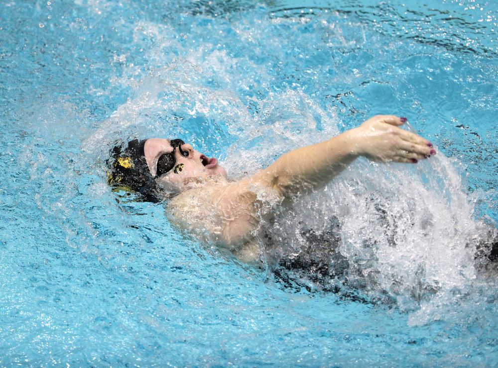 Iowa's Natalie McGovern swims the 100-yard backstroke against the Iowa State Cyclones in the Iowa Corn Cy-Hawk Series Friday, December 7, 2018 at at the Campus Recreation and Wellness Center. (Brian Ray/hawkeyesports.com)