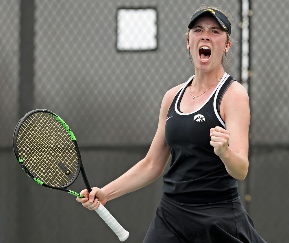 Iowa's Samantha Mannix celebrates after winning her match against Rutgers at the Hawkeye Tennis and Recreation Complex in Iowa City on Friday, Apr. 5, 2019. (Stephen Mally/hawkeyesports.com)