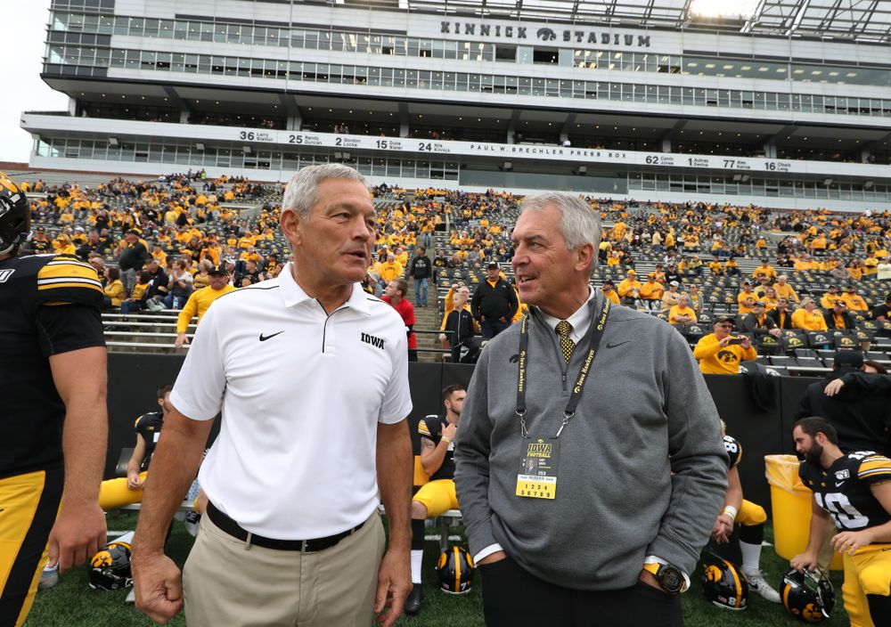 Iowa Hawkeyes head coach Kirk Ferentz and Henry B. and Patricia B. Tippie Director of Athletics Chair Gary Barta against Middle Tennessee State Saturday, September 28, 2019 at Kinnick Stadium. (Brian Ray/hawkeyesports.com)
