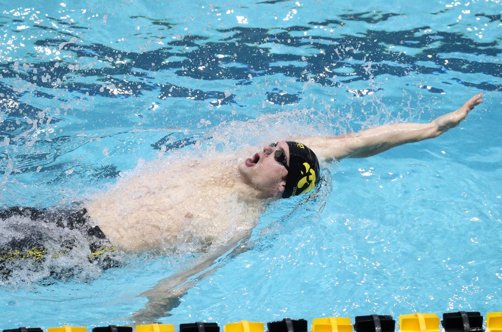 Iowa's Kenneth Mende competes in the 100-yard backstroke on the third day at the 2019 Big Ten Swimming and Diving Championships Thursday, February 28, 2019 at the Campus Wellness and Recreation Center. (Brian Ray/hawkeyesports.com)