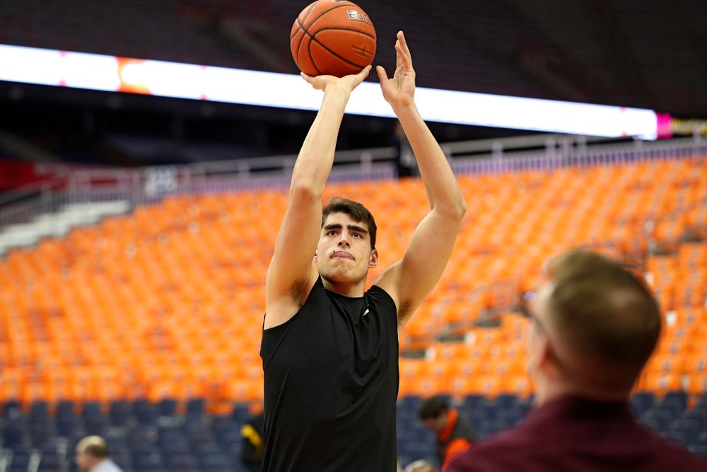 Iowa Hawkeyes center Luka Garza (55) warms up on the court before their ACC/Big Ten Challenge game at the Carrier Dome in Syracuse, N.Y. on Tuesday, Dec 3, 2019. (Stephen Mally/hawkeyesports.com)