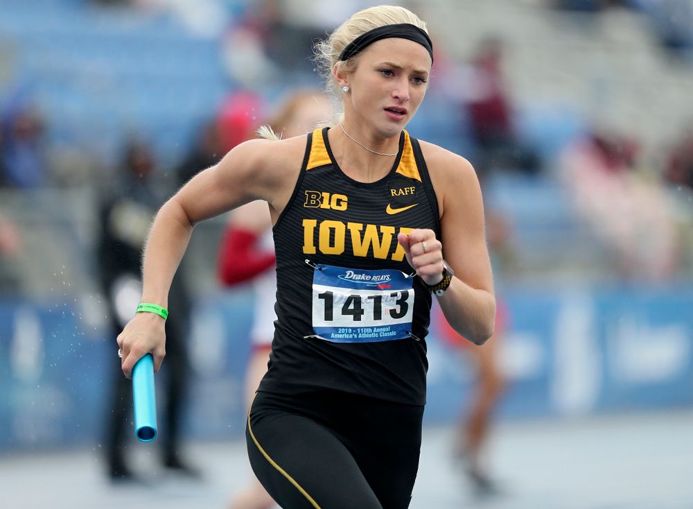 Iowa's Aly Weum runs the women's 1600 meter relay event during the third day of the Drake Relays at Drake Stadium in Des Moines on Saturday, Apr. 27, 2019. (Stephen Mally/hawkeyesports.com)