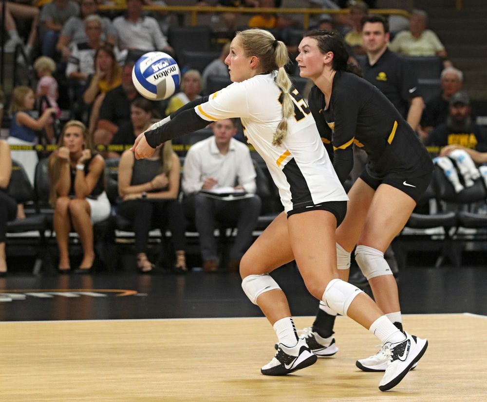 Iowa’s Maddie Slagle (15) gets a dig as Halle Johnston (4) looks on during their Big Ten/Pac-12 Challenge match at Carver-Hawkeye Arena in Iowa City on Saturday, Sep 7, 2019. (Stephen Mally/hawkeyesports.com)