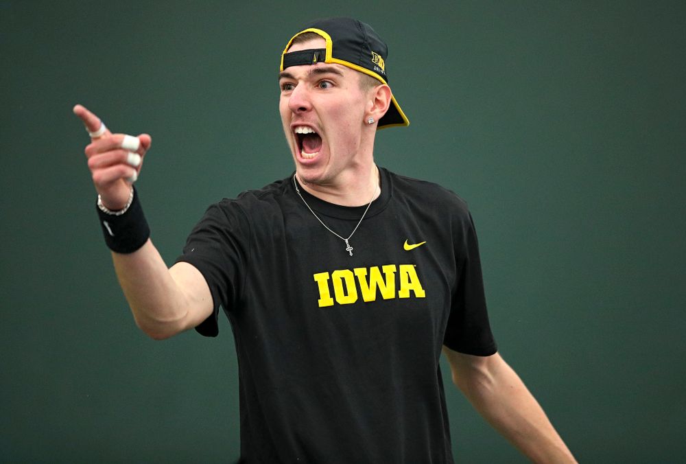 Iowa’s Nikita Snezhko celebrates a point during his doubles match at the Hawkeye Tennis and Recreation Complex in Iowa City on Friday, February 14, 2020. (Stephen Mally/hawkeyesports.com)
