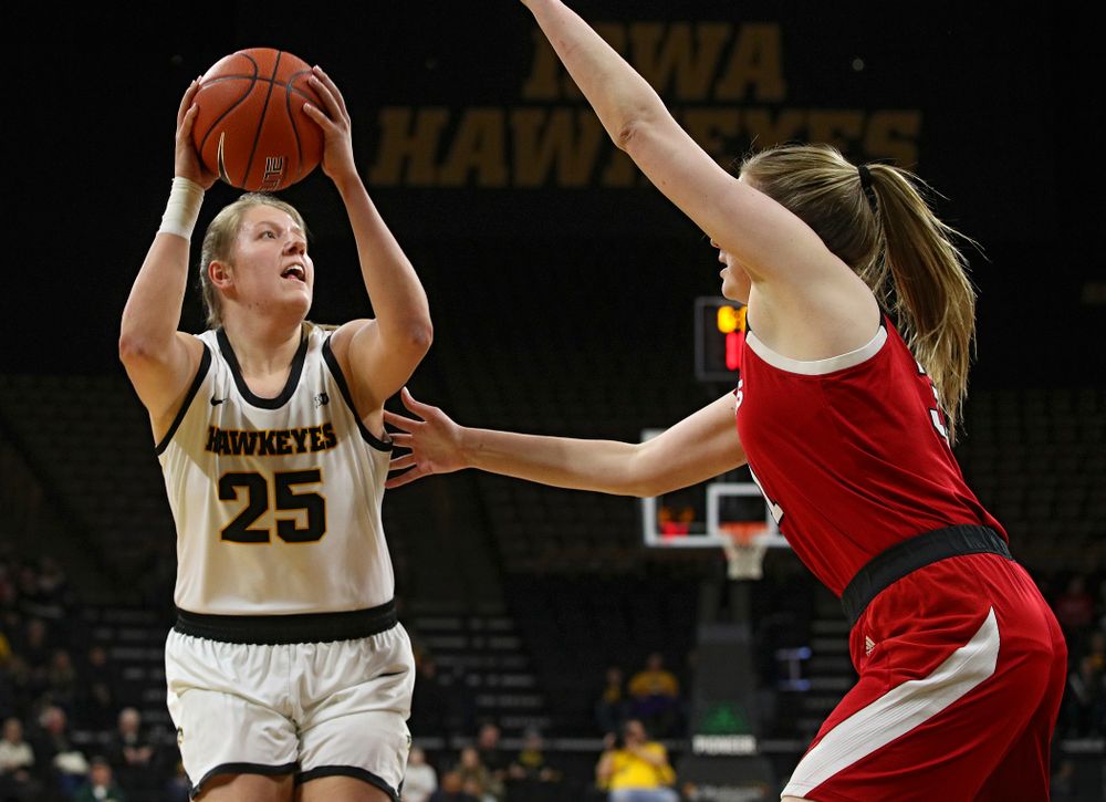 Iowa Hawkeyes forward Monika Czinano (25) goes up for a basket during the first quarter of the game at Carver-Hawkeye Arena in Iowa City on Thursday, February 6, 2020. (Stephen Mally/hawkeyesports.com)