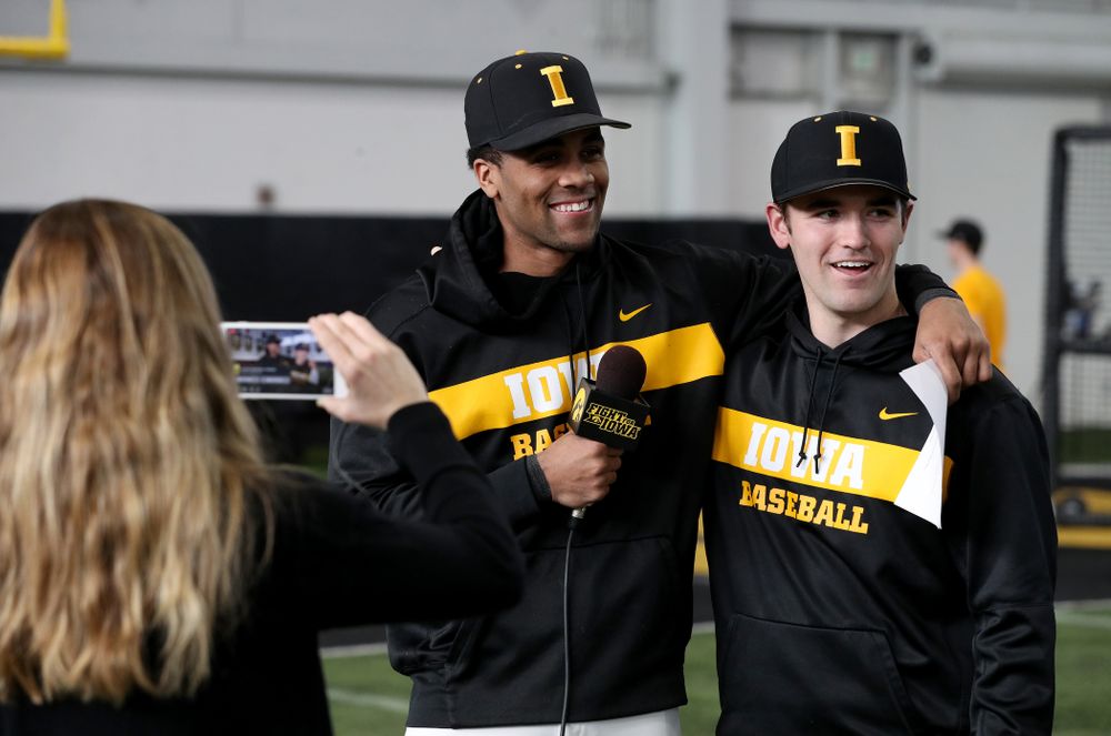 Iowa Hawkeyes infielder Lorenzo Elion (1) interviews outfielder Justin Jenkins (6) during their annual media day Thursday, February 6, 2020 at the Indoor Practice Facility. (Brian Ray/hawkeyesports.com)