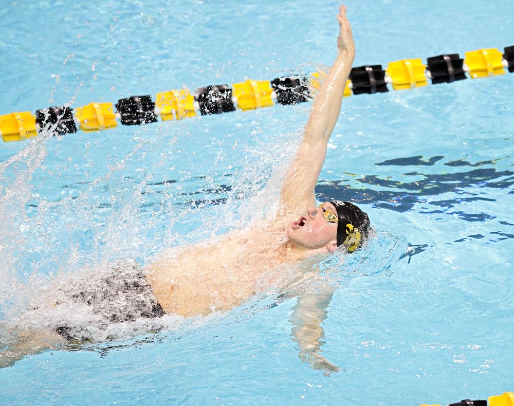 Iowa’s John Colin swims the men’s 50 yard backstroke event during their meet at the Campus Recreation and Wellness Center in Iowa City on Friday, February 7, 2020. (Stephen Mally/hawkeyesports.com)