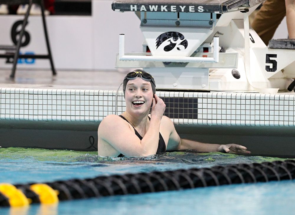 Iowa’s Kelsey Drake reacts as she looks a the video board and sees she broke a school record in a 200 yard butterfly time trial during the 2020 Big Ten Women’s Swimming and Diving Championships at the Campus Recreation and Wellness Center in Iowa City on Wednesday, February 19, 2020. (Stephen Mally/hawkeyesports.com)
