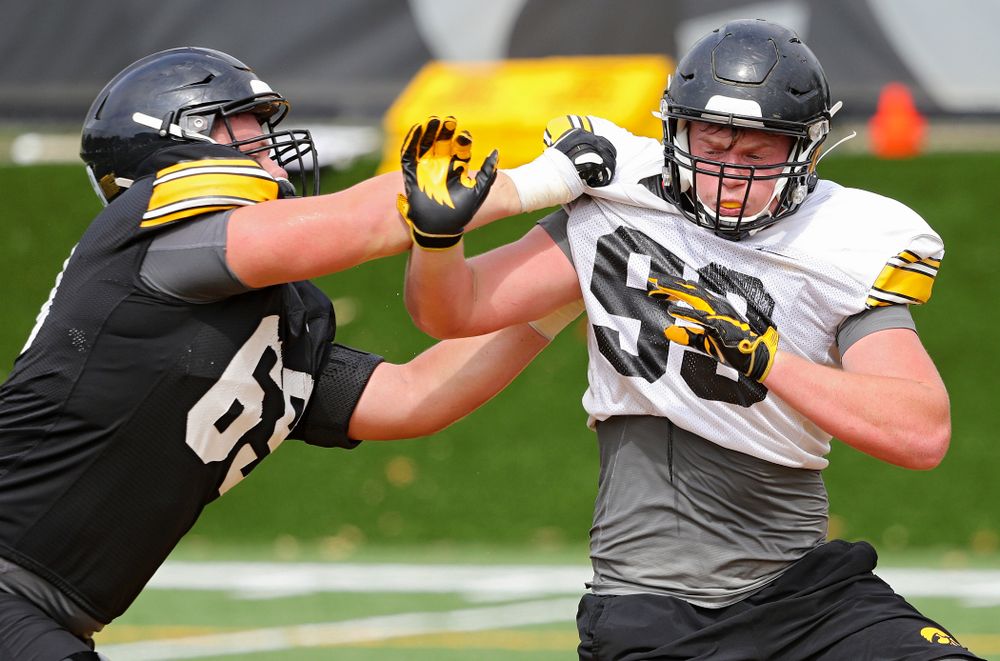 Iowa Hawkeyes offensive lineman Tyler Endres (69) blocks defensive lineman Chris Reames (98) during Fall Camp Practice No. 15 at the Hansen Football Performance Center in Iowa City on Monday, Aug 19, 2019. (Stephen Mally/hawkeyesports.com)