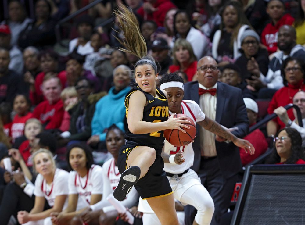 Iowa guard Gabbie Marshall (24) pulls in a ball during the third quarter of their game at the Rutgers Athletic Center in Piscataway, N.J. on Sunday, March 1, 2020. (Stephen Mally/hawkeyesports.com)