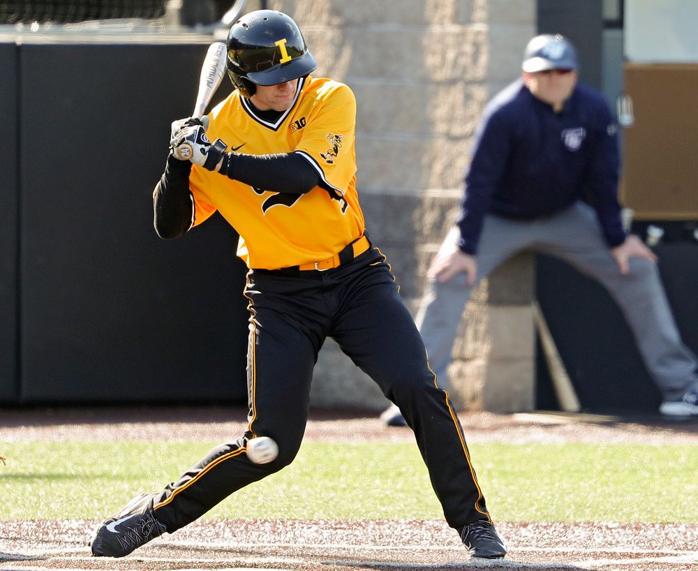 Iowa Hawkeyes designated hitter Austin Martin (34) is hit by a pitch during the first inning of their game at Duane Banks Field in Iowa City on Tuesday, Apr. 2, 2019. (Stephen Mally/hawkeyesports.com)