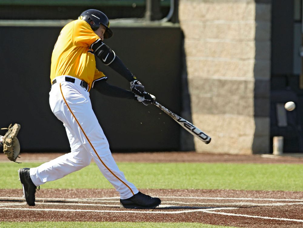 Iowa Hawkeyes right fielder Connor McCaffery (30) drives a pitch for a hit during the second inning against Illinois at Duane Banks Field in Iowa City on Sunday, Mar. 31, 2019. (Stephen Mally/hawkeyesports.com)