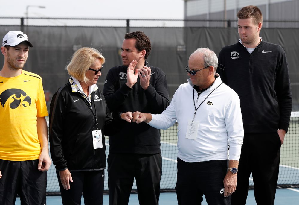Kirk and Diane Mellecker, of Park City, Utah, are recognized with the Hawkeyes before their game against Northwestern in the first round of the 2018 Big Ten Men's Tennis Tournament Thursday, April 26, 2018 at the Hawkeye Tennis and Recreation Complex. (Brian Ray/hawkeyesports.com)