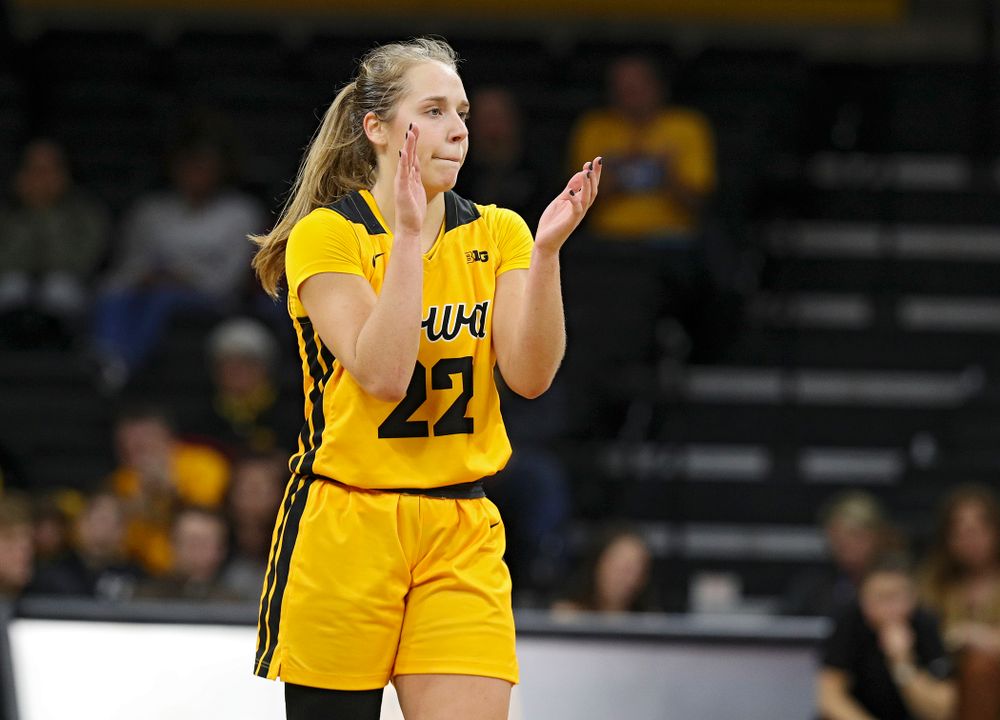 Iowa Hawkeyes guard Kathleen Doyle (22) claps during the fourth quarter of their game at Carver-Hawkeye Arena in Iowa City on Thursday, January 23, 2020. (Stephen Mally/hawkeyesports.com)