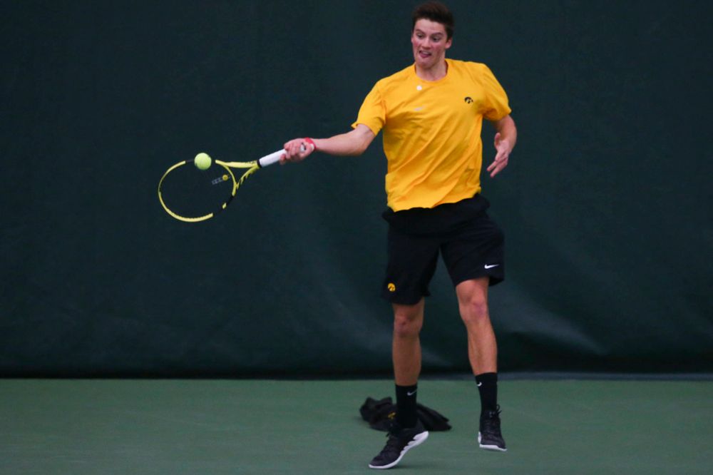 Iowa's Piotr Smietana at a tennis match vs Drake  Friday, March 8, 2019 at the Hawkeye Tennis and Recreation Complex. (Lily Smith/hawkeyesports.com)
