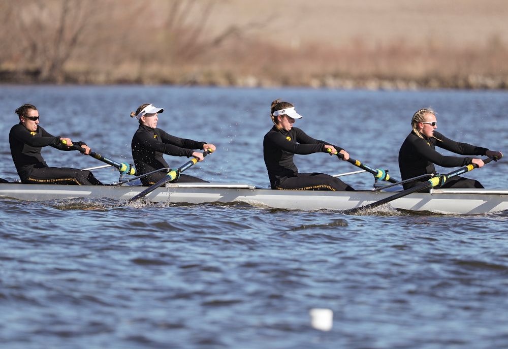 Iowa's Rachel Kram (from left), Lauren Collier, Noelle Ossenkop, and Erika Davidson during their I Novice 8 race against Wisconsin in their Big Ten Double Dual Rowing Regatta at Lake Macbride in Solon on Saturday, Apr. 13, 2019. (Stephen Mally/hawkeyesports.com)