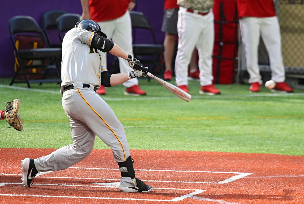 Iowa Hawkeyes outfielder Zeb Adreon (5) drives a pitch for a hit during the fifth inning of their CambriaCollegeClassic game at U.S. Bank Stadium in Minneapolis, Minn. on Friday, February 28, 2020. (Stephen Mally/hawkeyesports.com)
