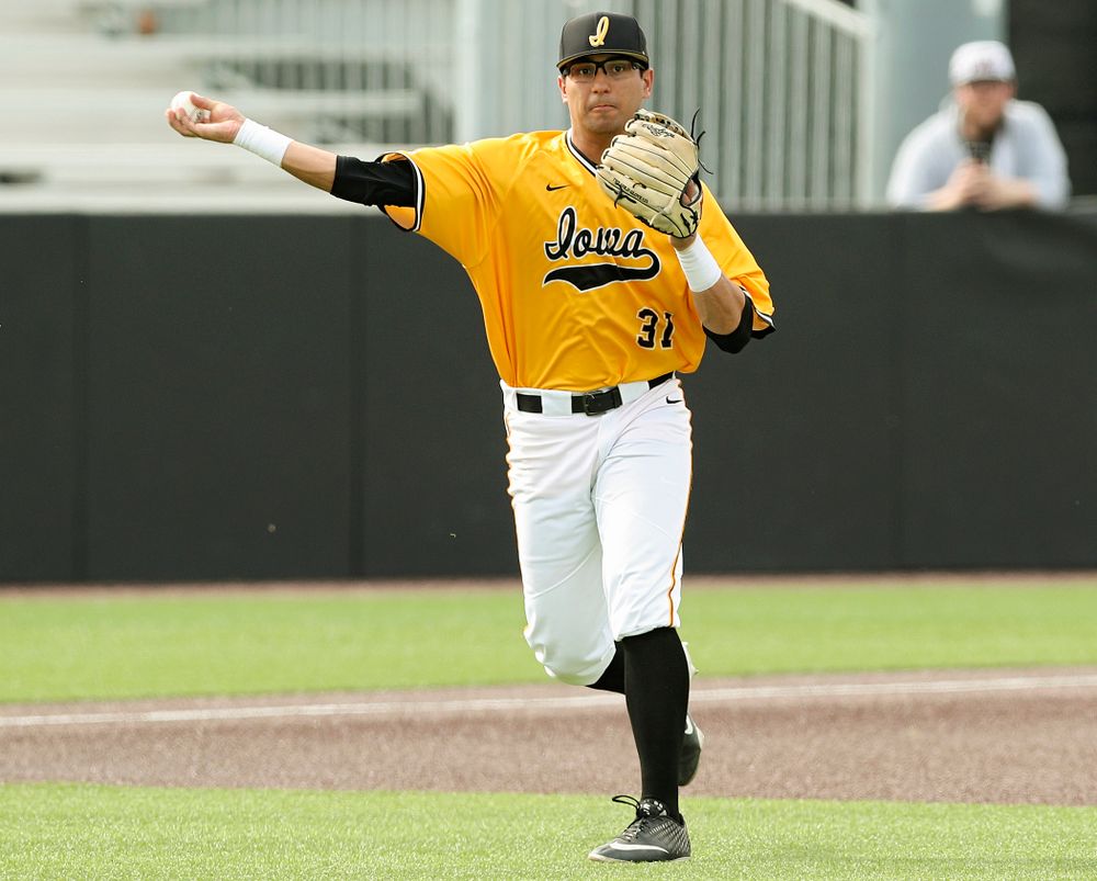 Iowa Hawkeyes third baseman Matthew Sosa (31) throws to first for an out during the first inning of their game against Northern Illinois at Duane Banks Field in Iowa City on Tuesday, Apr. 16, 2019. (Stephen Mally/hawkeyesports.com)