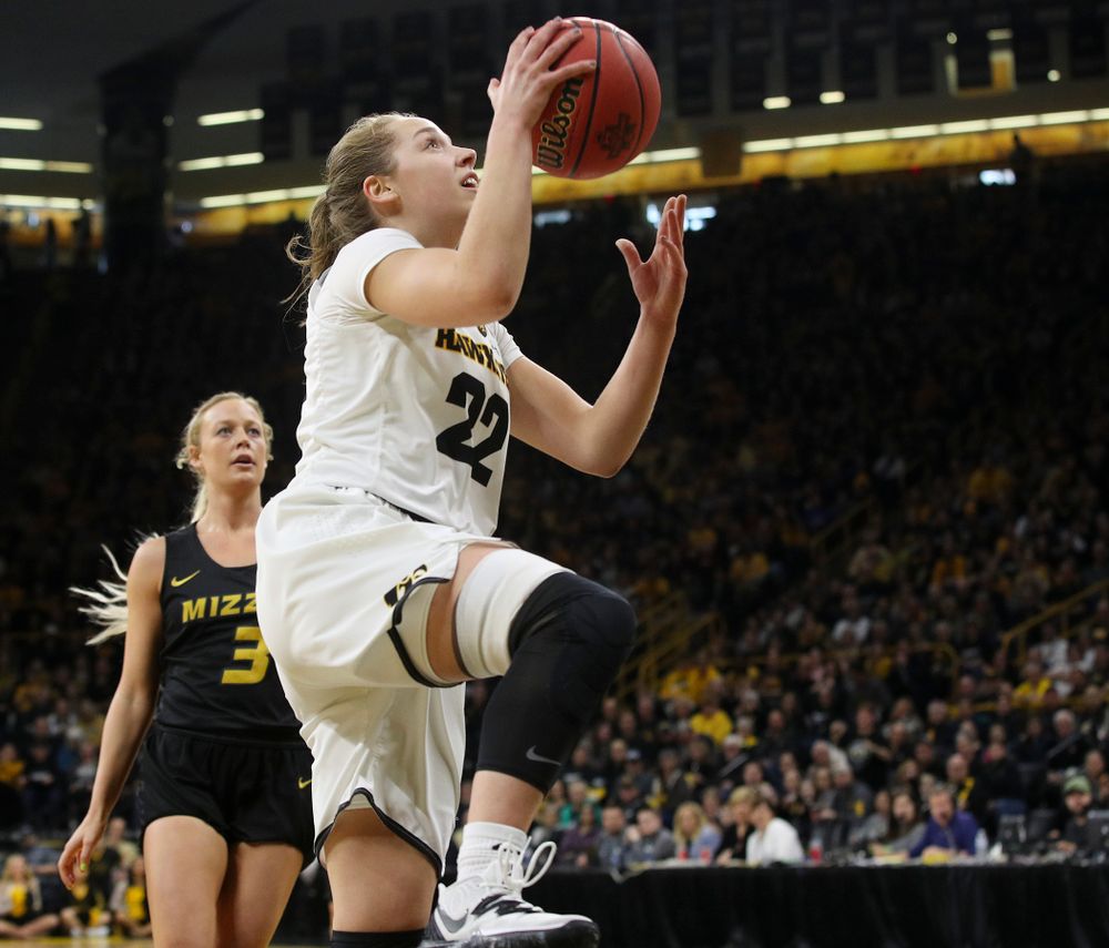 Iowa Hawkeyes guard Kathleen Doyle (22) scores a basket during the first quarter of their second round game in the 2019 NCAA Women's Basketball Tournament at Carver Hawkeye Arena in Iowa City on Sunday, Mar. 24, 2019. (Stephen Mally for hawkeyesports.com)