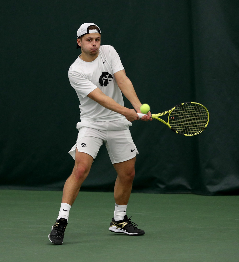 Iowa’s Will Davies against Cornell Sunday, March 8, 2020 at the Hawkeye Tennis and Recreation Center. (Brian Ray/hawkeyesports.com)