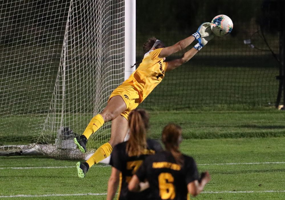 Iowa Hawkeyes goalkeeper Claire Graves (1) makes a diving save against Western Michigan Thursday, August 22, 2019 at the Iowa Soccer Complex. (Brian Ray/hawkeyesports.com)