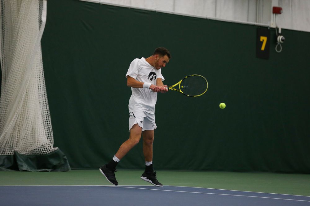 Iowa’s Kareem Allaf hits a backhand during the Iowa men’s tennis match vs Western Michigan on Saturday, January 18, 2020 at the Hawkeye Tennis and Recreation Complex. (Lily Smith/hawkeyesports.com)