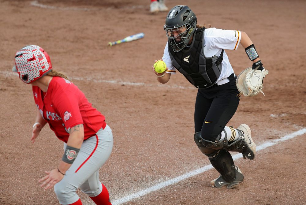 Iowa catcher Abby Lien (9) chases a runner back to third base after fielding a bunt during the sixth inning of their game against Ohio State at Pearl Field in Iowa City on Friday, May. 3, 2019. (Stephen Mally/hawkeyesports.com)