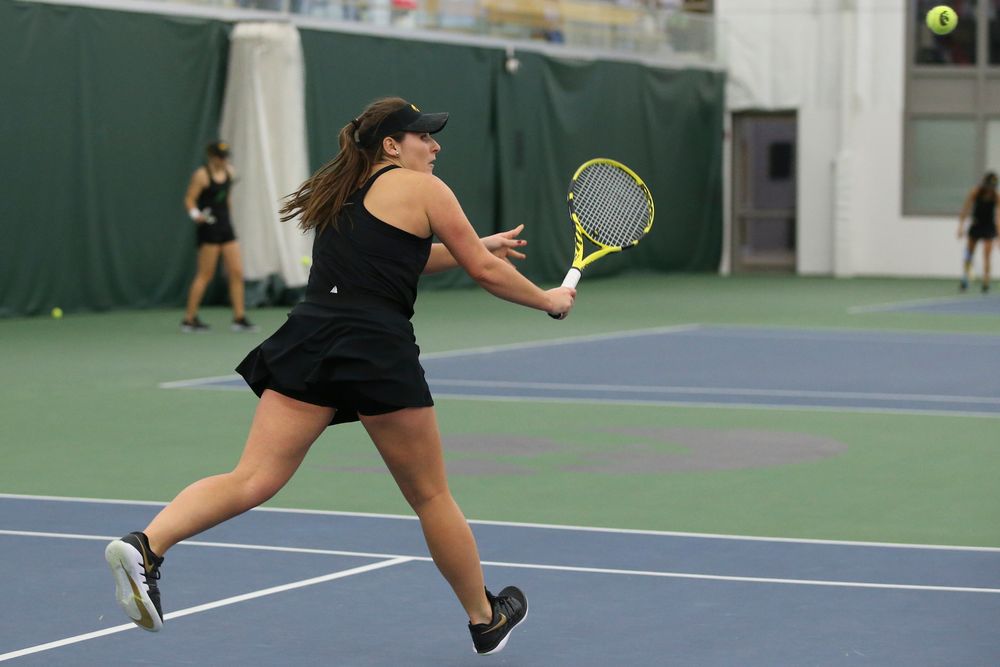 Iowa’s Danielle Bauers returns a hit during the Iowa women’s tennis meet vs UNI  on Saturday, February 29, 2020 at the Hawkeye Tennis and Recreation Complex. (Lily Smith/hawkeyesports.com)