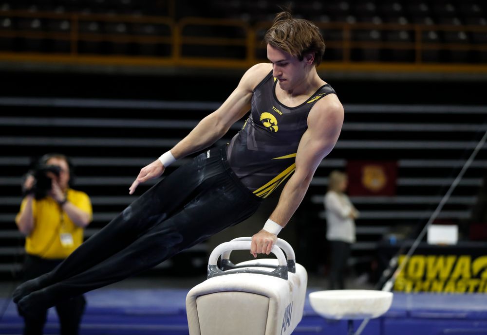 Elijah Parsells competes on the pommel horse  against Minnesota and Air Force 