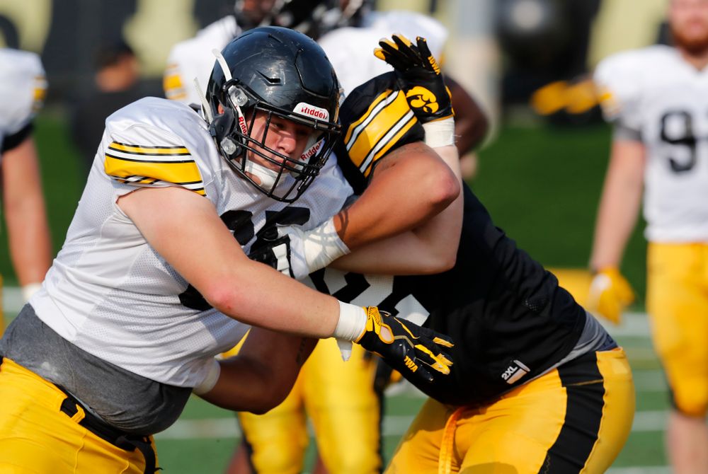 Iowa Hawkeyes defensive lineman Tyler Linderbaum (65) during camp practice No. 16 Tuesday, August 21, 2018 at the Hansen Football Performance Center. (Brian Ray/hawkeyesports.com)