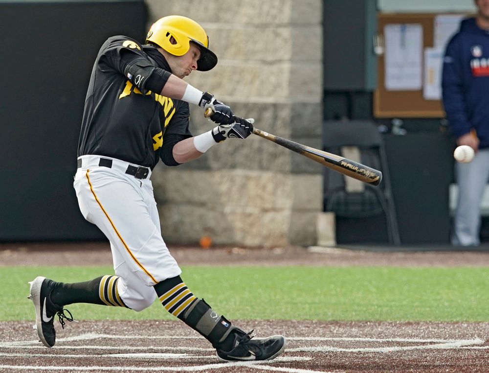 Iowa Hawkeyes second baseman Mitchell Boe (4) drives a pitch for a single during the fourth inning of their game against Illinois at Duane Banks Field in Iowa City on Saturday, Mar. 30, 2019. (Stephen Mally/hawkeyesports.com)