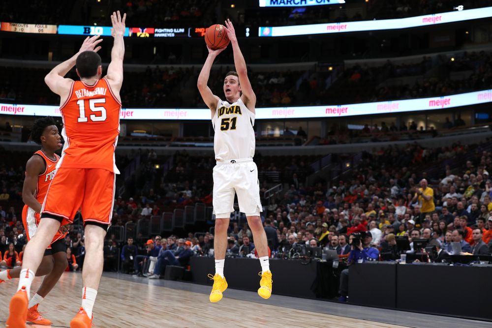 Iowa Hawkeyes forward Nicholas Baer (51) against the Illinois Fighting Illini in the 2019 Big Ten Men's Basketball Tournament Thursday, March 14, 2019 at the United Center in Chicago. (Brian Ray/hawkeyesports.com)