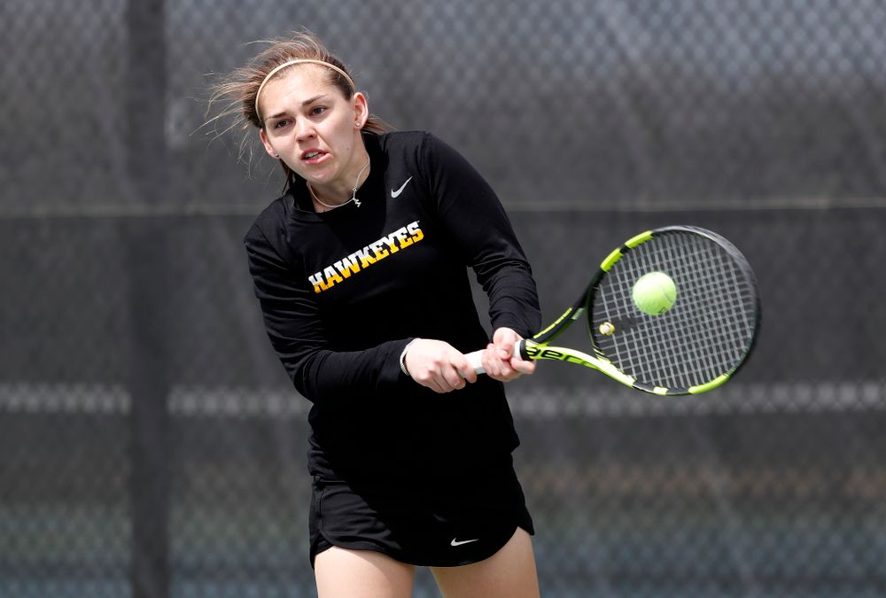 Iowa's Zoe Douglas against the Wisconsin Badgers Sunday, April 22, 2018 at the Hawkeye Tennis and Recreation Center. (Brian Ray/hawkeyesports.com)