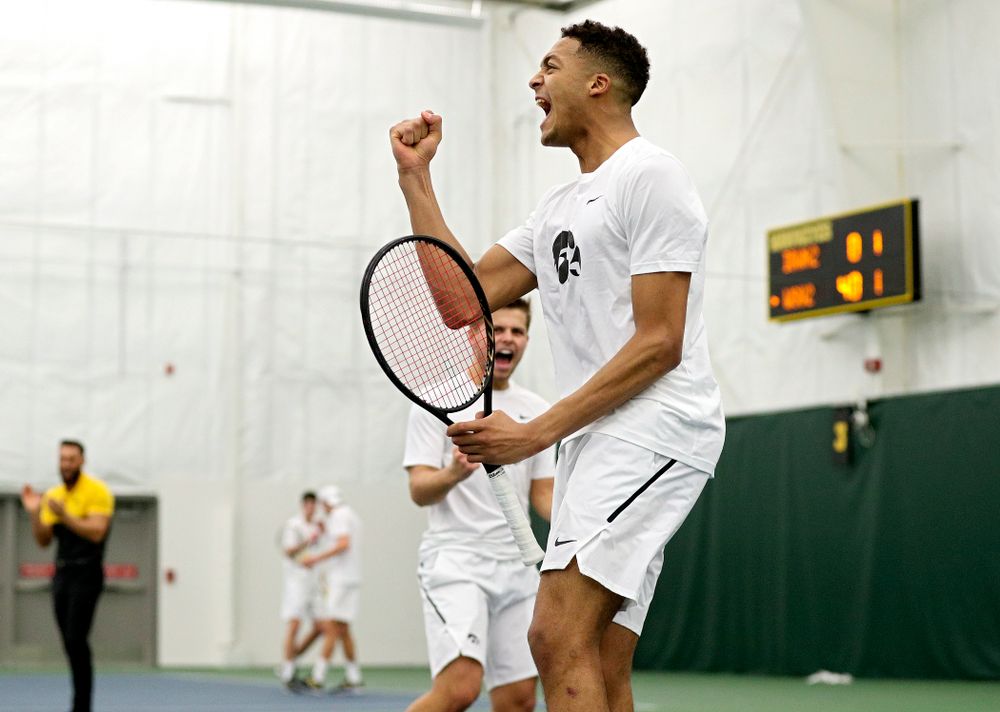Iowa’s Oliver Okonkwo celebrates a point during his doubles match at the Hawkeye Tennis and Recreation Complex in Iowa City on Sunday, February 16, 2020. (Stephen Mally/hawkeyesports.com)
