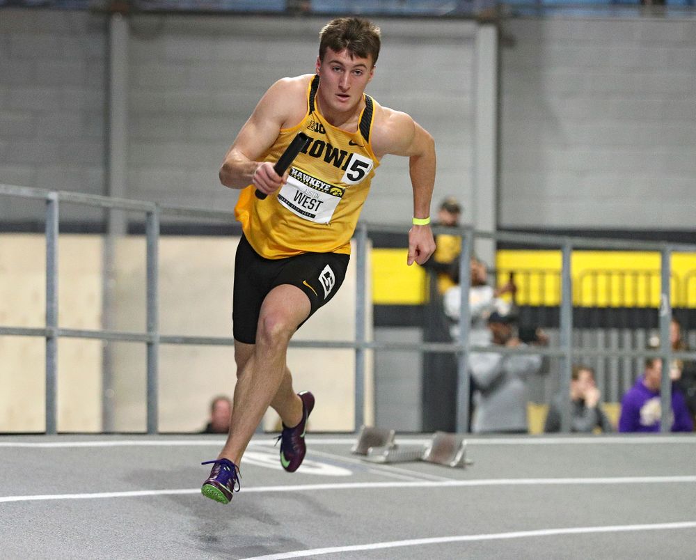 Iowa’s Austin West runs the men’s 1600 meter relay event during the Hawkeye Invitational at the Recreation Building in Iowa City on Saturday, January 11, 2020. (Stephen Mally/hawkeyesports.com)