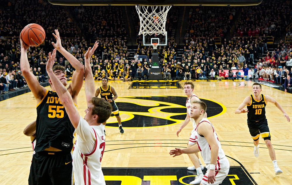 Iowa Hawkeyes center Luka Garza (55) puts up a shot during the second half of their game at Carver-Hawkeye Arena in Iowa City on Monday, January 27, 2020. (Stephen Mally/hawkeyesports.com)