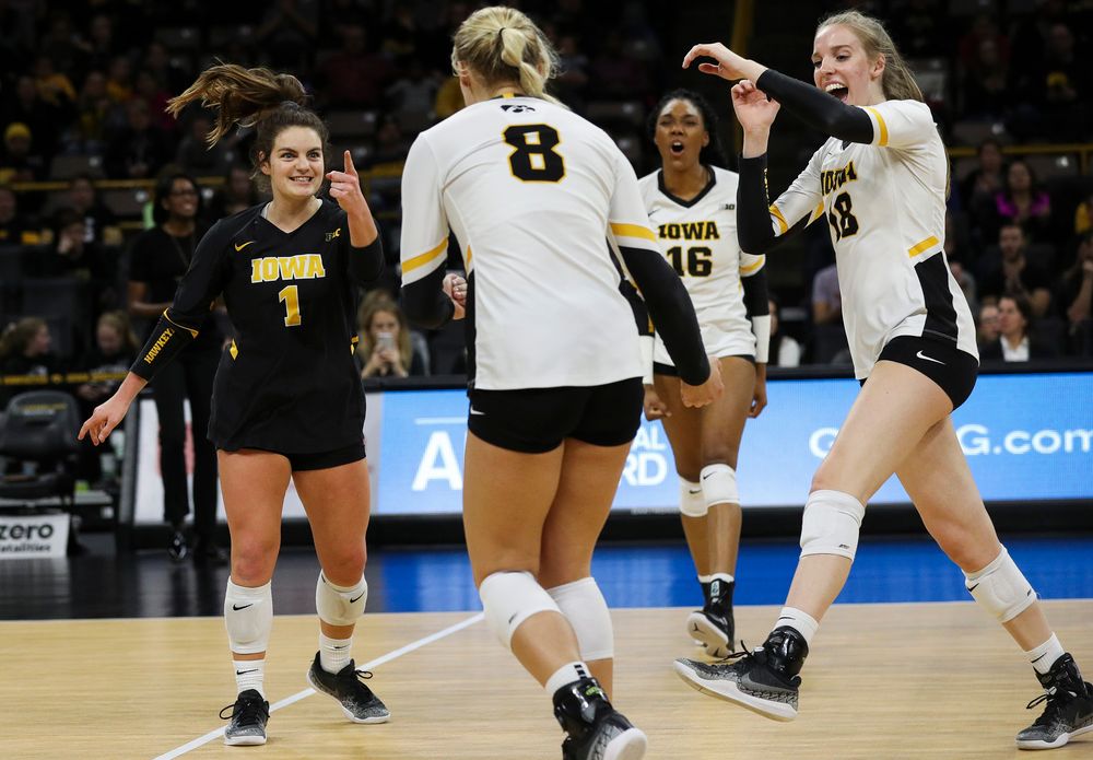 Iowa Hawkeyes defensive specialist Molly Kelly (1) and Iowa Hawkeyes middle blocker Hannah Clayton (18) celebrate after winning a point during a match against Maryland at Carver-Hawkeye Arena on November 23, 2018. (Tork Mason/hawkeyesports.com)