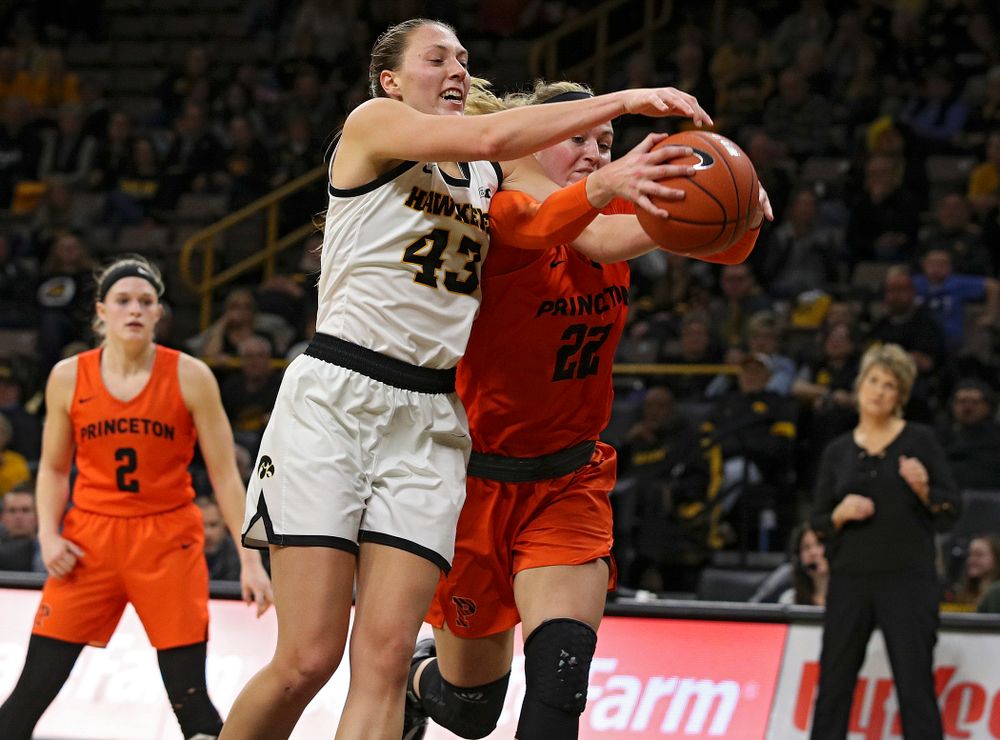 Iowa forward Amanda Ollinger (43) battles for a rebound during the fourth quarter of their overtime win against Princeton at Carver-Hawkeye Arena in Iowa City on Wednesday, Nov 20, 2019. (Stephen Mally/hawkeyesports.com)