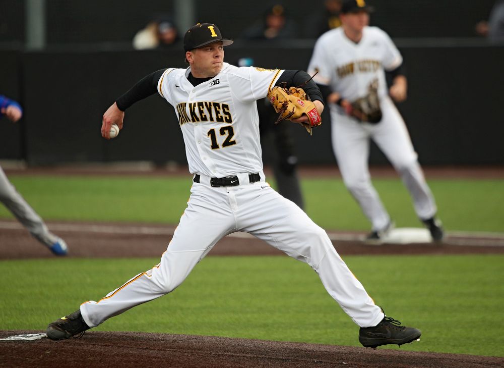 Iowa pitcher Drew Irvine (12) delivers to the plate during the sixth inning of their college baseball game at Duane Banks Field in Iowa City on Wednesday, March 11, 2020. (Stephen Mally/hawkeyesports.com)