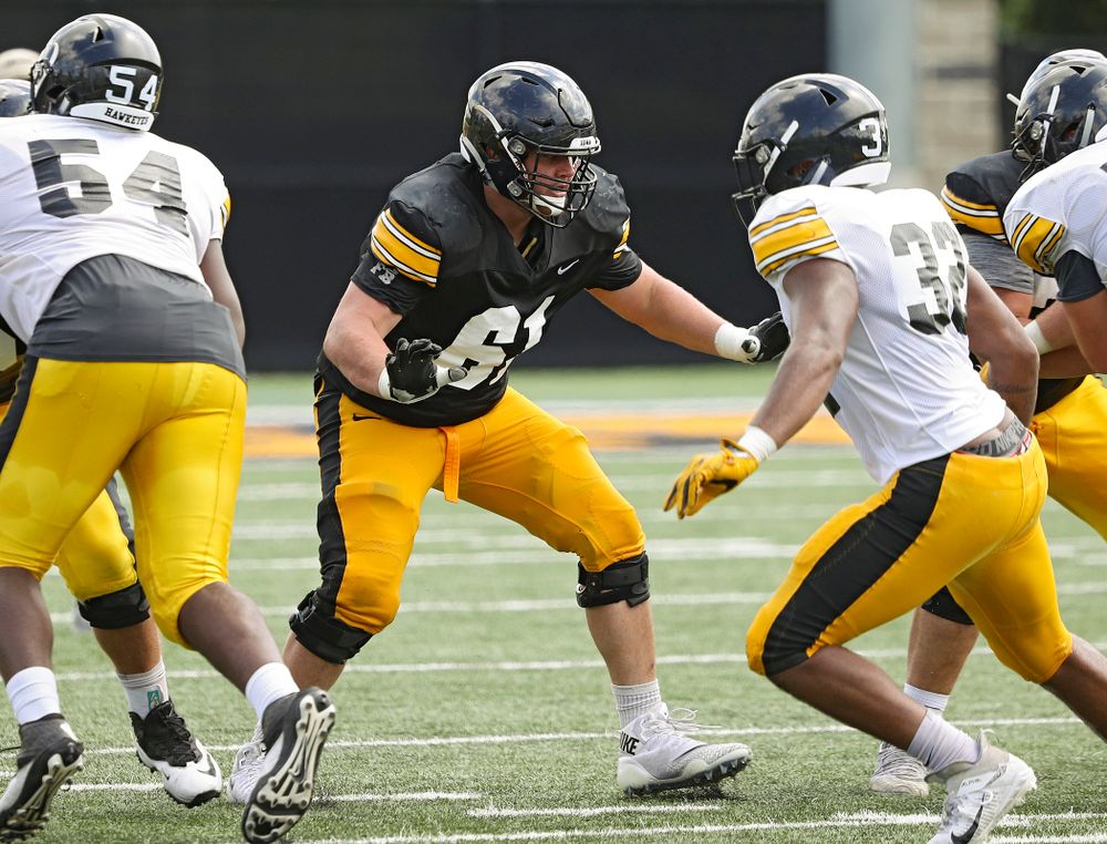Iowa Hawkeyes offensive lineman Cole Banwart (61) looks to block during Fall Camp Practice No. 11 at the Hansen Football Performance Center in Iowa City on Wednesday, Aug 14, 2019. (Stephen Mally/hawkeyesports.com)