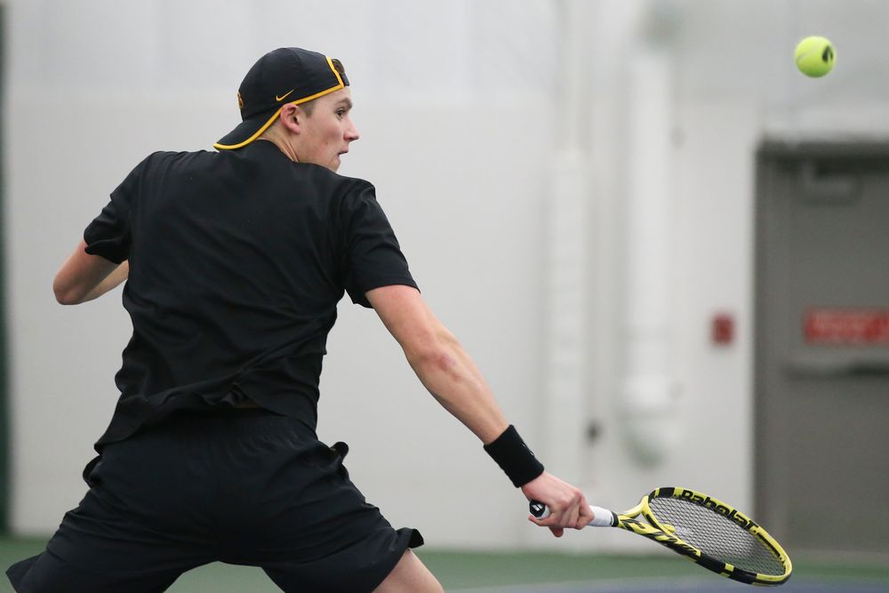 Iowa’s Joe Tyler returns a hit during the Iowa men’s tennis meet vs VCU  on Saturday, February 29, 2020 at the Hawkeye Tennis and Recreation Complex. (Lily Smith/hawkeyesports.com)