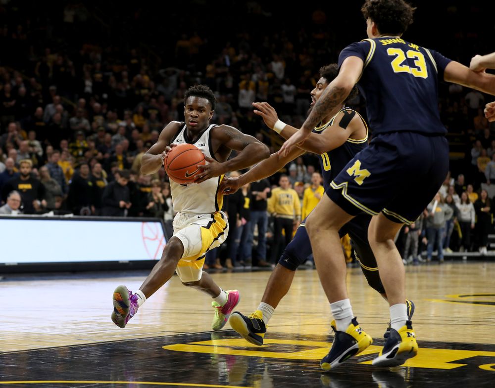 Iowa Hawkeyes guard Joe Toussaint (1) drives to the hoop against the Michigan Wolverines Friday, January 17, 2020 at Carver-Hawkeye Arena. (Brian Ray/hawkeyesports.com)