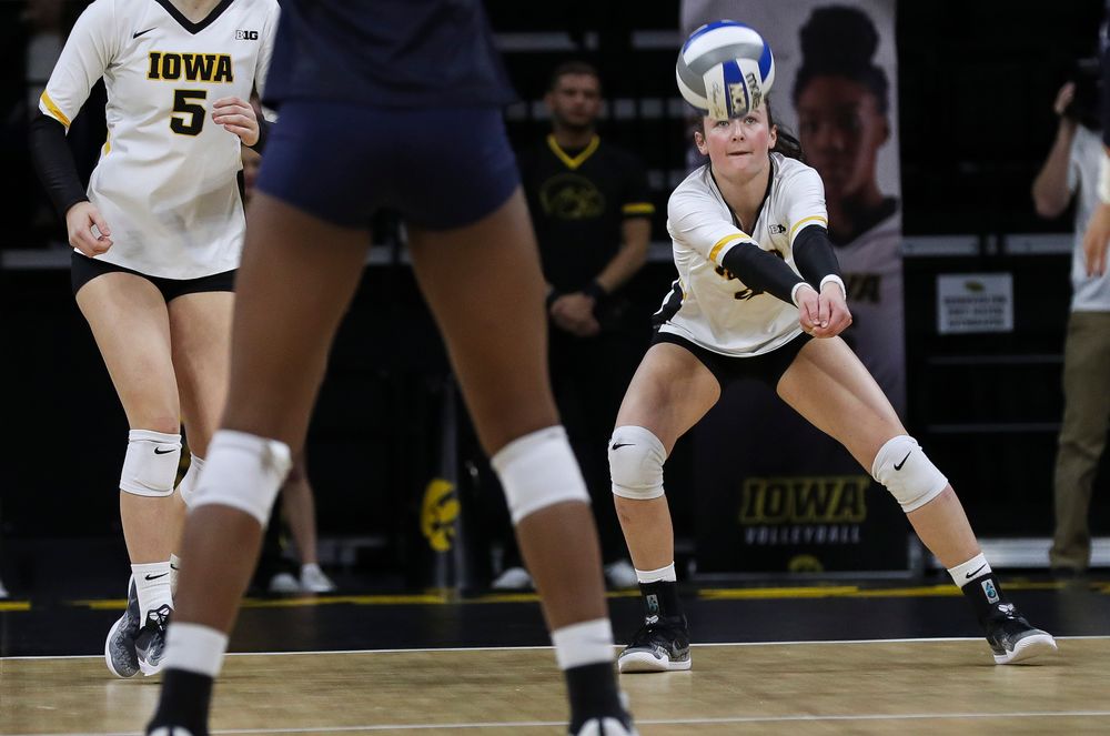 Iowa Hawkeyes defensive specialist Halle Johnston (4) bumps the ball during a match against Penn State at Carver-Hawkeye Arena on November 3, 2018. (Tork Mason/hawkeyesports.com)