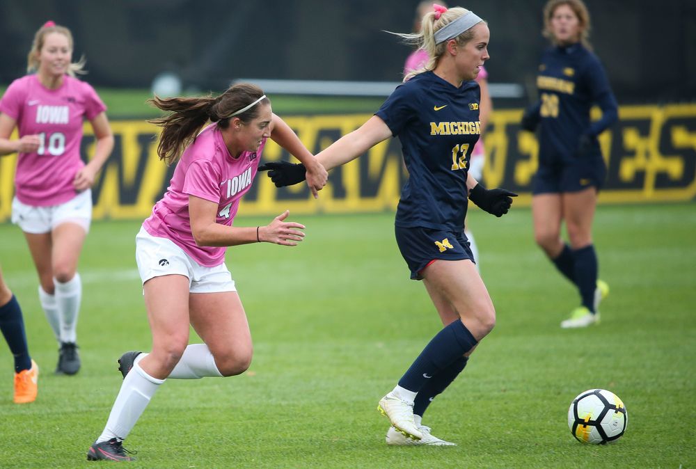 Iowa Hawkeyes forward Kaleigh Haus (4) defends during a game against Michigan at the Iowa Soccer Complex on October 14, 2018. (Tork Mason/hawkeyesports.com)