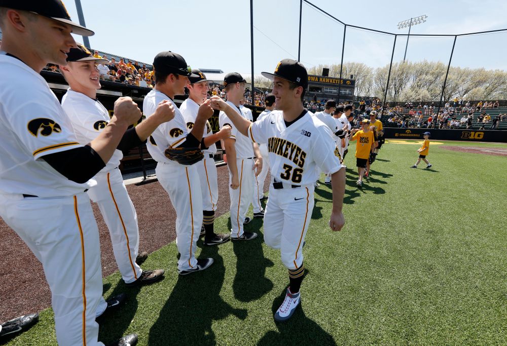 Iowa All American Wrestler Michael Kemerer throws out a first pitch before the Iowa Hawkeyes game against the Oklahoma State Cowboys Saturday, May 5, 2018 at Duane Banks Field. (Brian Ray/hawkeyesports.com)