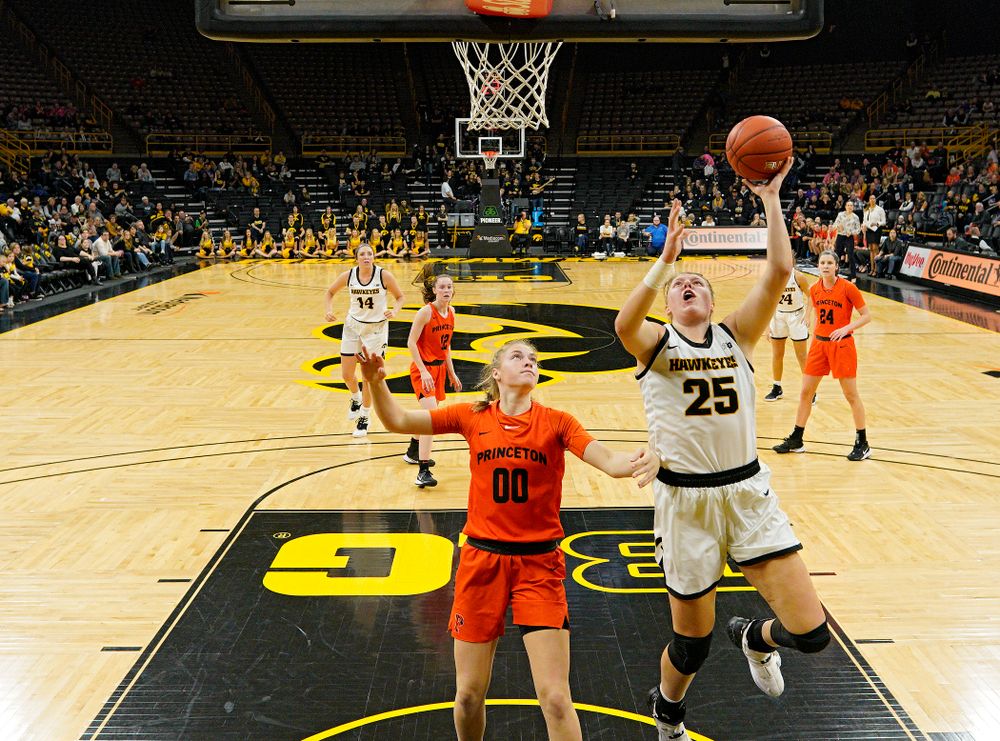 Iowa forward/center Monika Czinano (25) scores a basket during the fourth quarter of their overtime win against Princeton at Carver-Hawkeye Arena in Iowa City on Wednesday, Nov 20, 2019. (Stephen Mally/hawkeyesports.com)