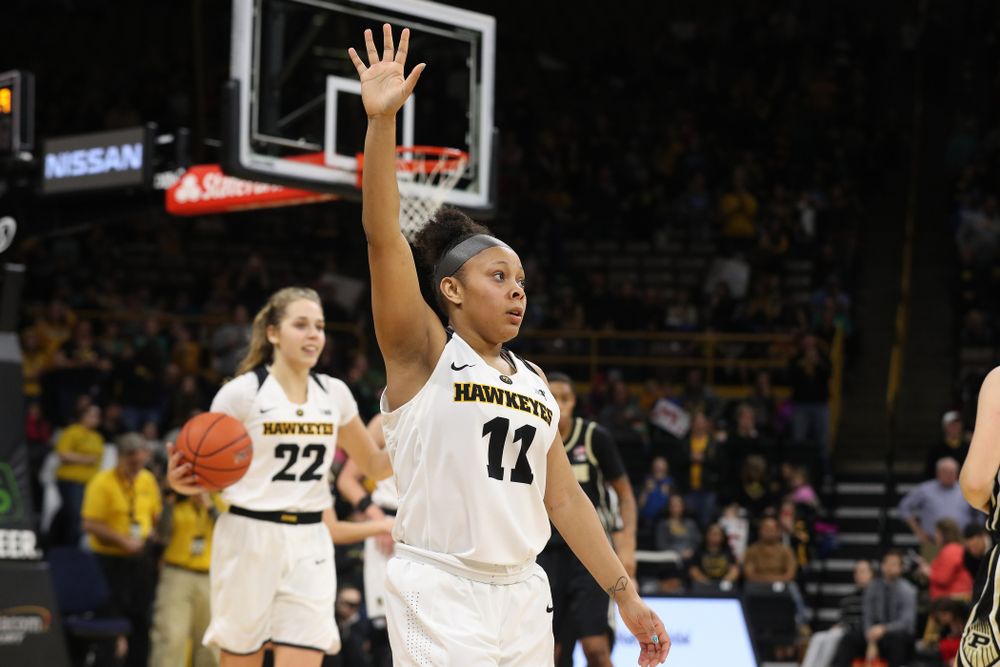 Iowa Hawkeyes guard Tania Davis (11) celebrates their win against the Purdue Boilermakers Sunday, January 27, 2019 at Carver-Hawkeye Arena. (Brian Ray/hawkeyesports.com)
