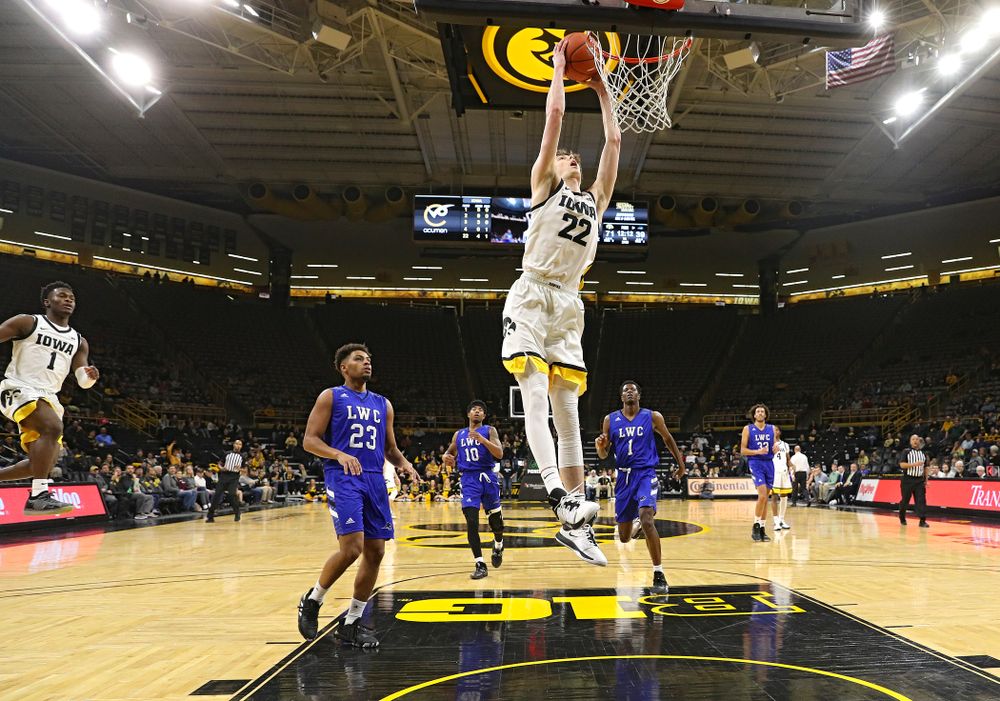 Iowa Hawkeyes forward Patrick McCaffery (22) dunks the ball during the second half of their exhibition game against Lindsey Wilson College at Carver-Hawkeye Arena in Iowa City on Monday, Nov 4, 2019. (Stephen Mally/hawkeyesports.com)